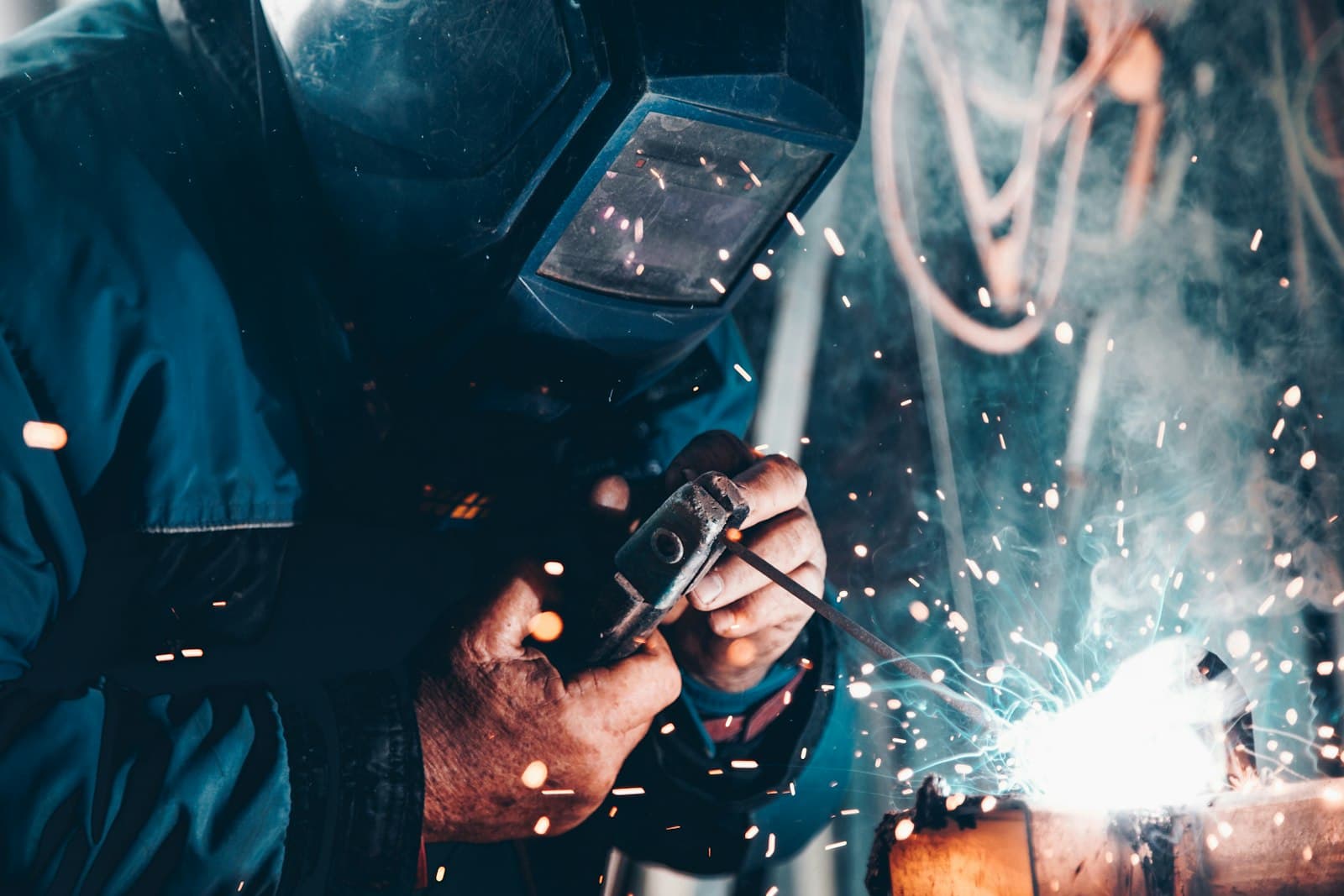 Field technician performing precision work on terminal equipment